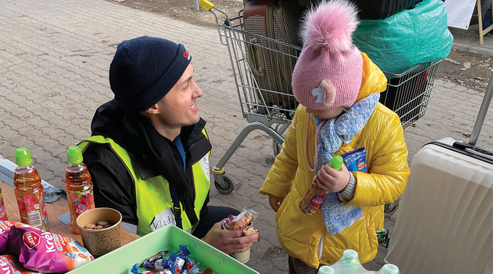 Vlad Wallace feeding refugees from Ukraine